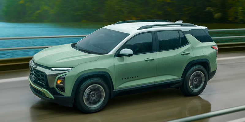 New 2026 Chevrolet Equinox cruising on river side