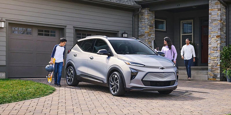 Family entering Chevy Bolt EUV
