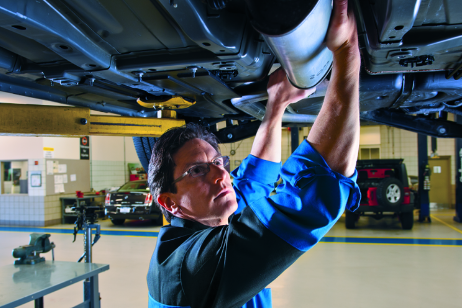 Technician working on a vehicle